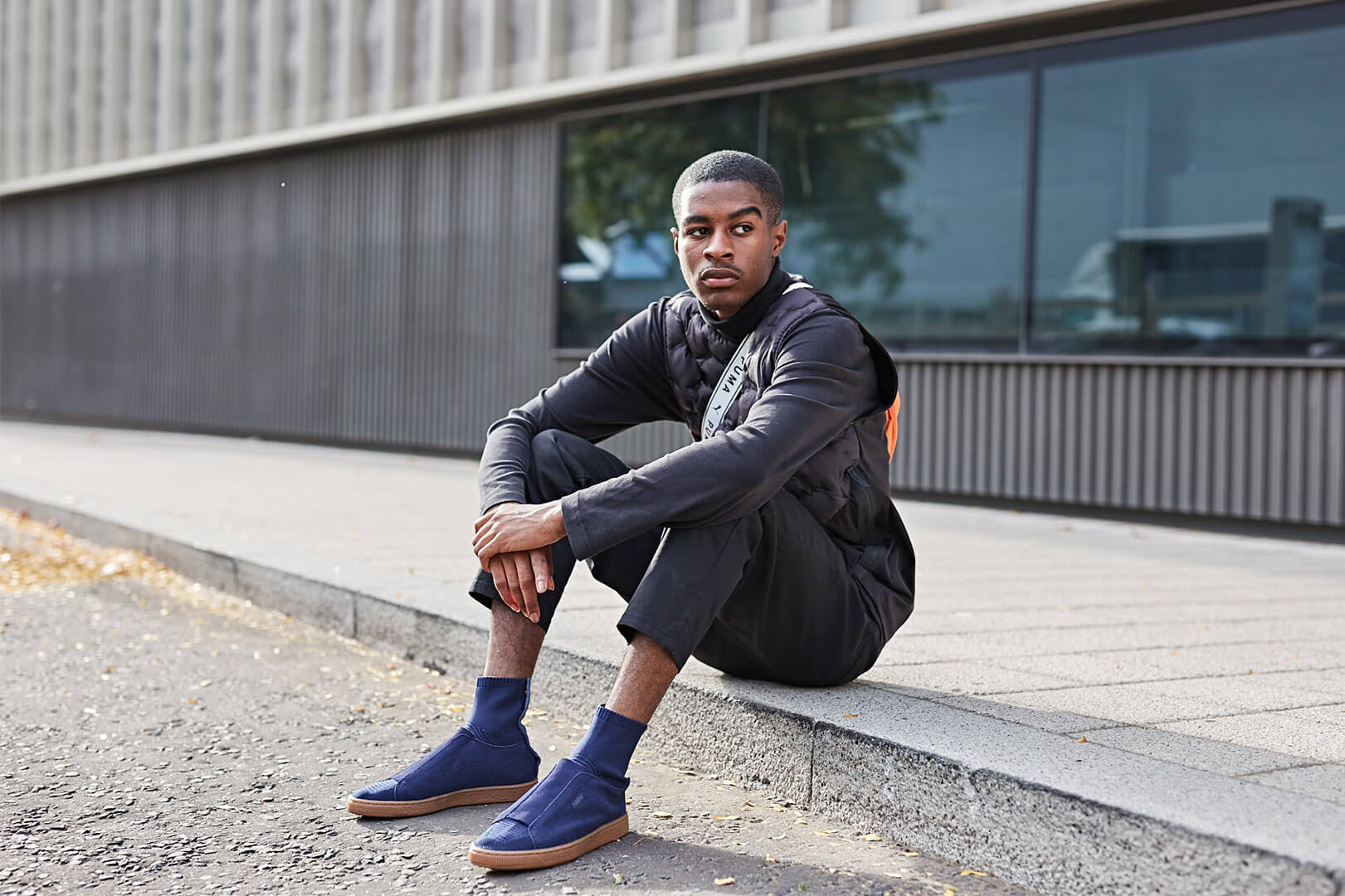 Model wearing PUMA x POGGY Suede Classic