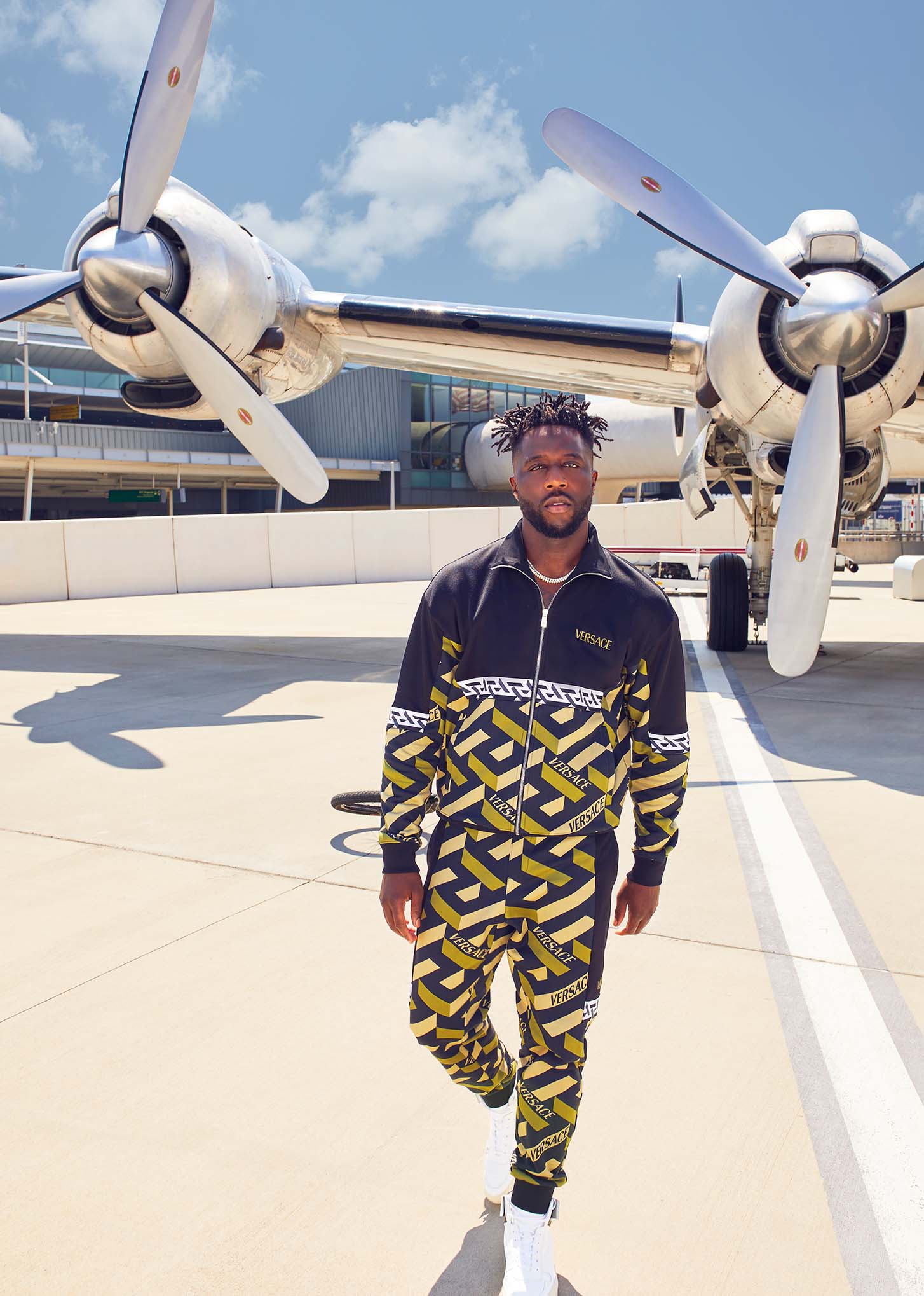 Shop Versace Combo Monogram Track Pants